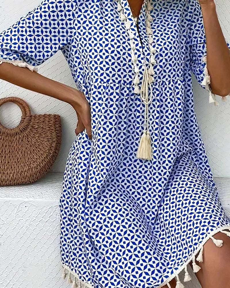 ND | Tania - Mini-robe bleue groovy à manches courtes