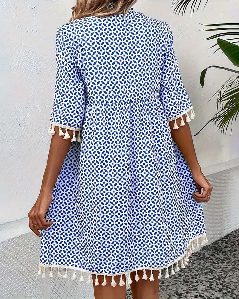 ND | Tania - Mini-robe bleue groovy à manches courtes