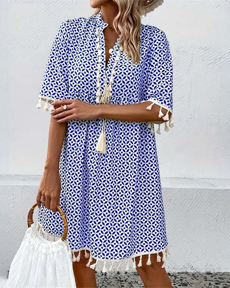 ND | Tania - Mini-robe bleue groovy à manches courtes