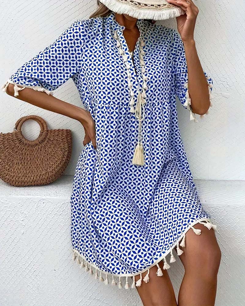 ND | Tania - Mini-robe bleue groovy à manches courtes