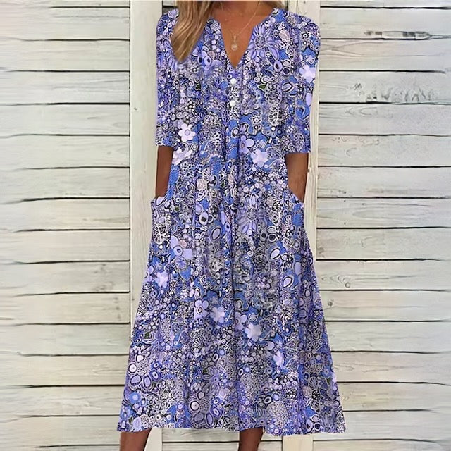 ND | robe florale avec décolleté en V et poches latérales
