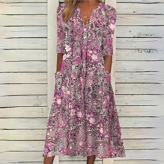 ND | robe florale avec décolleté en V et poches latérales