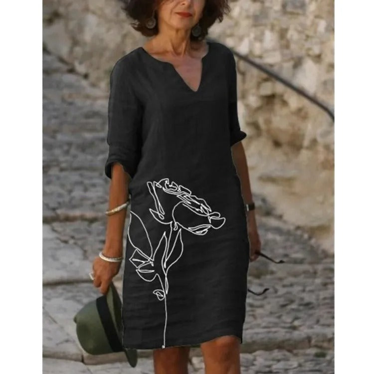 EP | Robe midi avec décolleté en V et imprimé fleuri