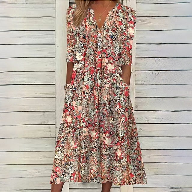 ND | robe florale avec décolleté en V et poches latérales